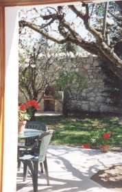 Cottage view of the terrace, garden and BBQ